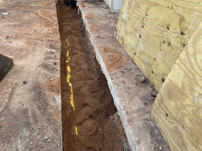 Under-slab line work inside a commercial building