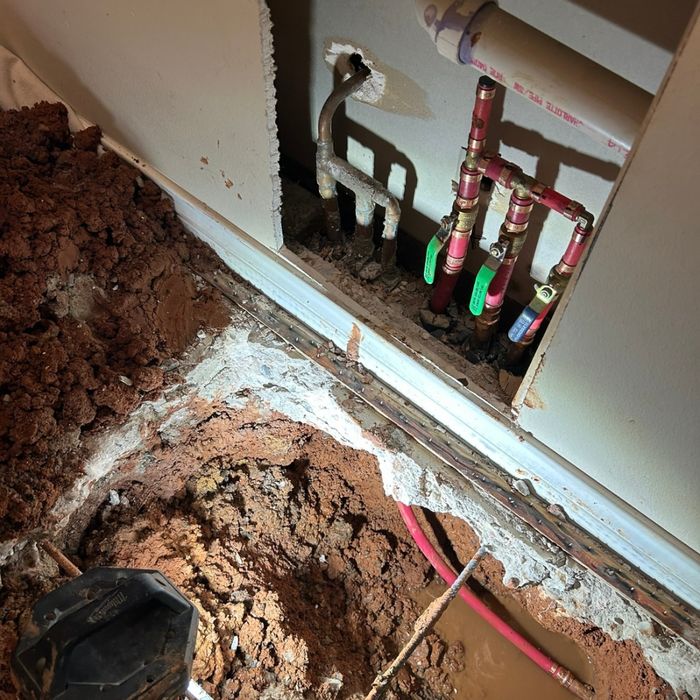 Slab leak repair with rerouted PEX water line